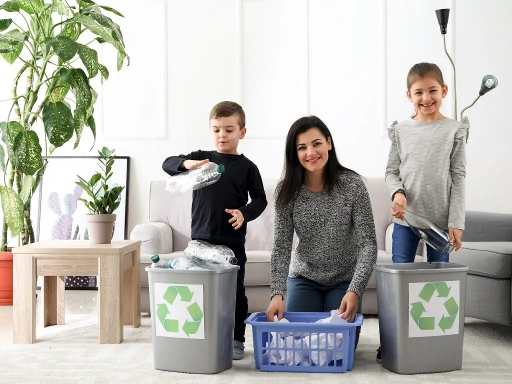 best zero waste home ideas for families with kids sustainable lifestyle eco friendly family kitchen with reusable containers and cloth bags children helping parents with composting in a zero waste home sustainable family living with reusable items and bulk shopping