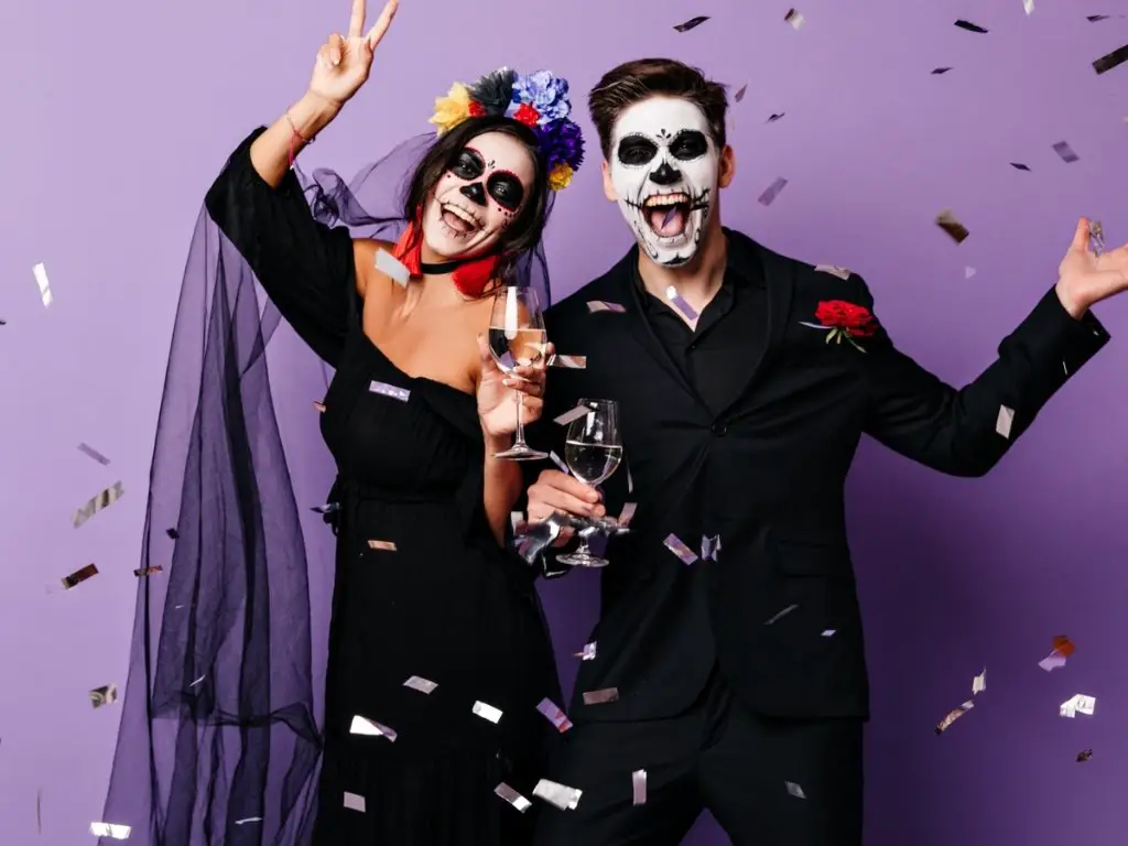 Eco-friendly couple and group Halloween costumes made from recycled clothing Friends wearing sustainable Halloween costumes created with thrifted fashion DIY eco-friendly Halloween costumes for couples and groups with upcycled materials Sustainable group Halloween costume ideas for students and families