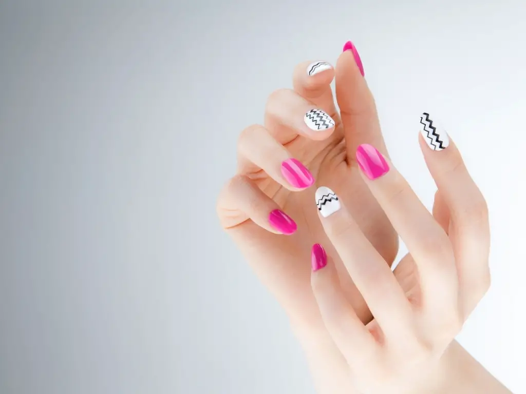 minimalist halloween nail designs for a chic spooky season with matte black nails and silver accents chic minimalist halloween manicure with ombre purple nails and simple geometric shapes spooky season minimalist halloween nails with black and orange striped designs elegant minimalist halloween nail art featuring negative space and bat silhouettes