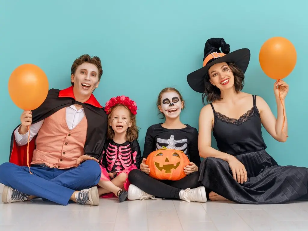 15 sustainable family halloween costumes that save money with eco friendly ideas Family wearing diy halloween costumes made from recycled materials Kids and parents in budget friendly halloween costumes created from old clothes Zero waste family halloween costumes that save money and reduce waste
